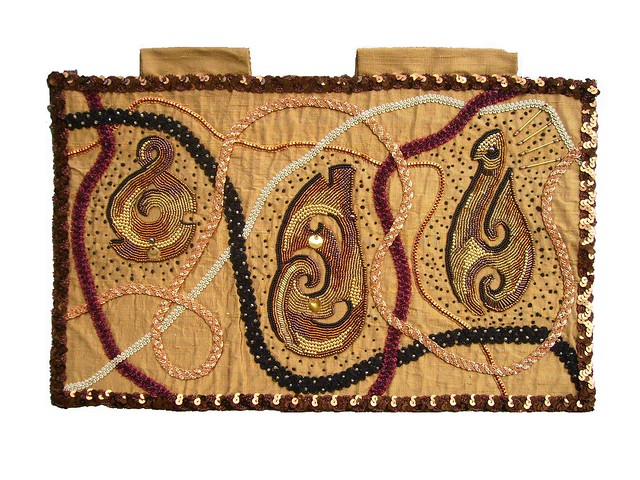 Maori symbols Dark gold raw silk Hand embroidery beading