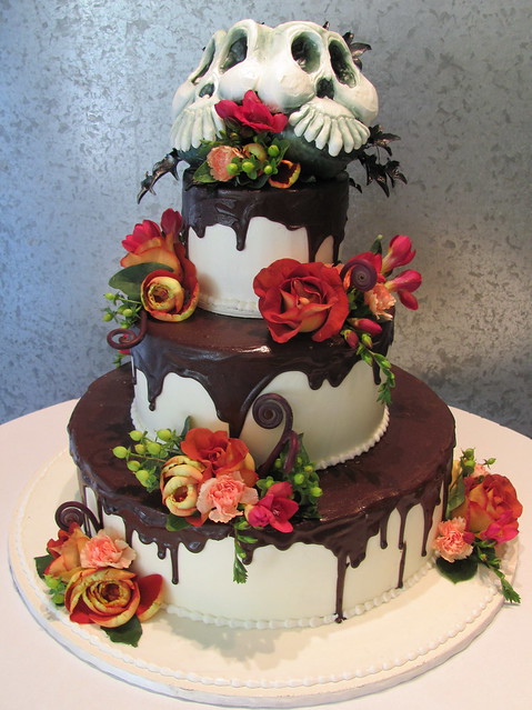 Gothic Wedding Tiered wedding cake with 2 skulls on top