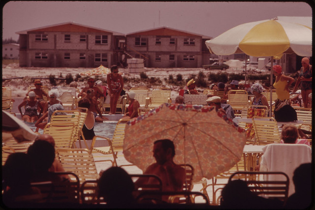 Residents of Century Village, a New Retirement Community Sun Themselves at Poolside. The Entire Village of 7,838 Units (Individually-Owned Condominiums) Is Due for Completion in the Spring of 1974.