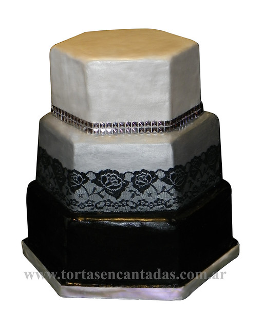 Three hexagonal tiers One black one silver with black lace detail 