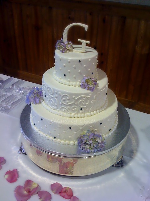 Hydrangea Wedding Cake Fresh hydrangeas accent this elegant cake topped 