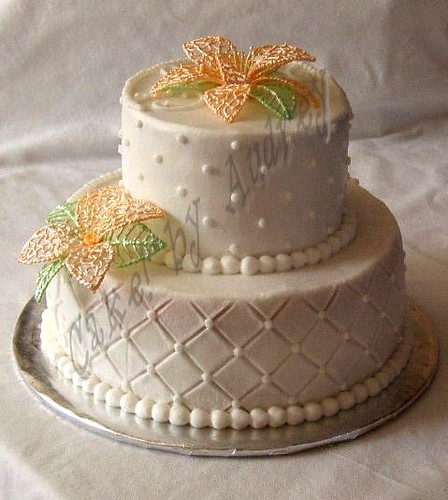 Wedding Cake Sample Side 2 Buttercream icing on two tier ckae with quilting