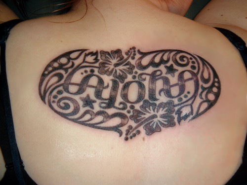 This ambigram as a finished tattoo The word reads the same when flipped 