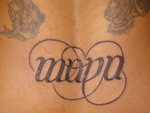 This ambigram as a finished tattoo One name reads as the other when flipped