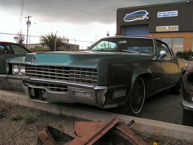 1967 Cadillac Eldorado its winking Outside a couple repair shops in 