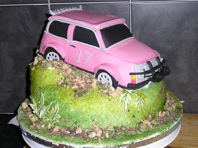 this was a girls cake she wanted a pink suzuki jeep
