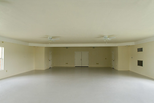 Large empty white room, VFW Hall, rural Leander, Texas. Architecture of empty space