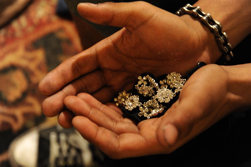 Hands full of jewelry, chain bracelet, Wedgwood, Seattle, Washington, USA by Wonderlane