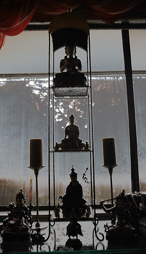 personal shrine, Vajrasattva, Lord Buddha, Padmasambhava, Arya Tara, Manjushri, Vajra Garuda, and candles by Wonderlane