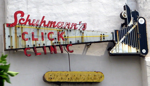 Schuhmann's Click Clinic old sign