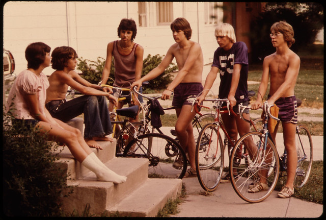 Youths Congregate Around the Front Steps of a Home in New Ulm, Minnesota, to Decide What to Do on a Summer Day...
