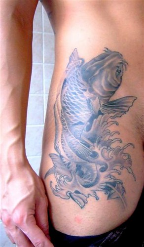 Koi tattoo Artist Anthony Yeo from First Tattoo Peninsular Shopping