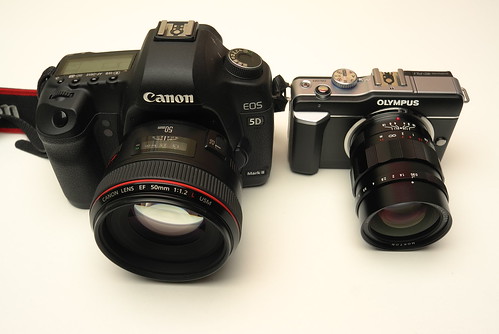 Canon 5DII + EF 50/1.2L and Olympus PEN E-PL1 + Voigtländer Nokton 25/0.95 mFT, size comparison