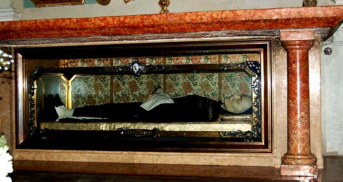 Waxwork of Blessed James of Ulm in a glass coffin.