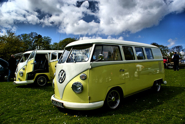 VW Split Screen Buses A pair of matching VW Buses catch the rays of an