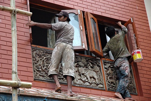 Second story painters, bamboo scaffolding, dragons and elephants decor, Boudha, Kathmandu, Nepal by Wonderlane