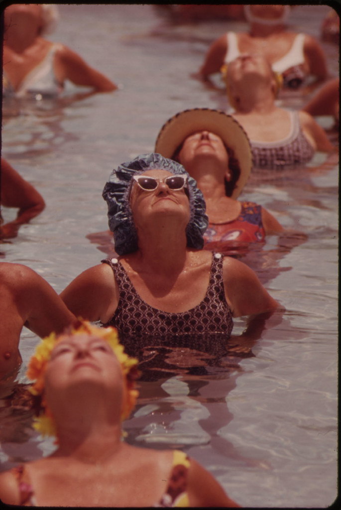 Residents Take Part in Organized Daily Exercises in One of the Public Pools at Century Village Retirement Community.
