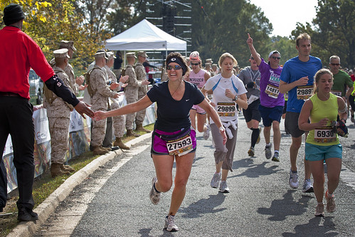 Runners cross the finish line of the 35th Marine Corps Marathon 