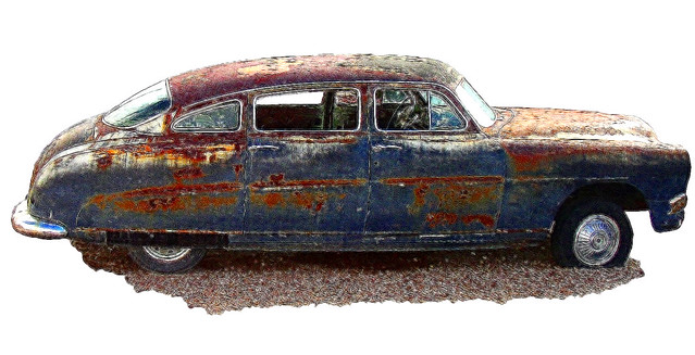 This is a view of an old rusted car in Holbrok Arizona on Route 66 