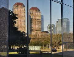 Reflection of Four Leaf Towers high rise at San Felipe