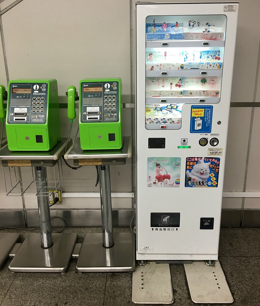 Fuchiko - Edge of the cup vending machine at Akihabara. コップのフチ子