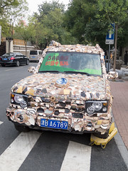 Pottery covered Land Rover