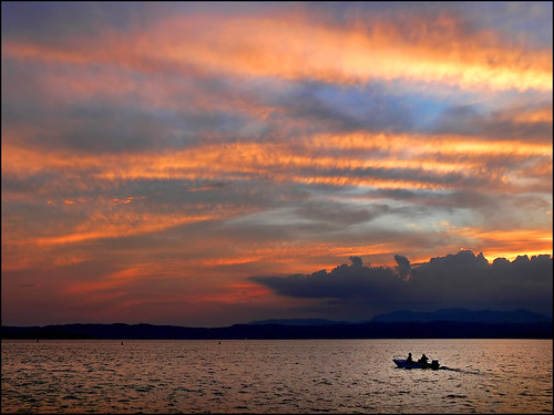 sunset sky italy lake water silhouette boat garda italia lakegarda lagodigarda