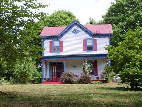 blue red house building home window glass architecture virginia arch panel victorian structure porch attic colored residence posts trim brackets entry eaves gable lunette transom doubledoor boydton scrolled mecklenburgcounty diamondpane slidelights
