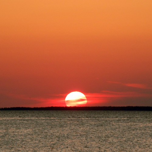 sunset sky sun beach water evening michigan glowing massiveattack huron lakehuron celestial 55200 portaustin d40