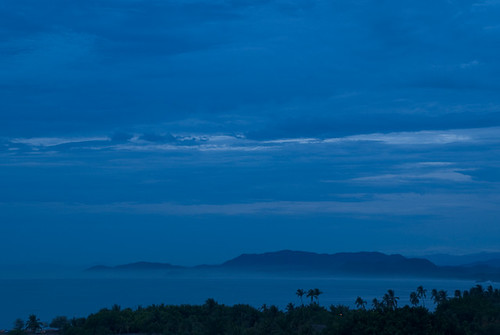 ocean blue sea sky mountain tree nature water fog clouds sunrise