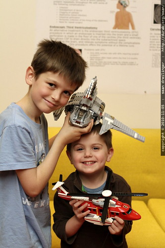 boys with their birthday toys   nick with emperor palpatine's shuttle and sequoia with lego city fire helicopter