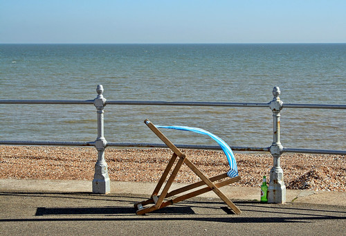 uk sea england beach deckchair unitedkingdom shingle windy promenade railings englishchannel beerbottle lamanche bexhill larigan phamilton summertimeuk