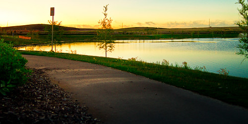 park blue sunset summer panorama green water grass yellow skies glow view path panoramic hills liquid