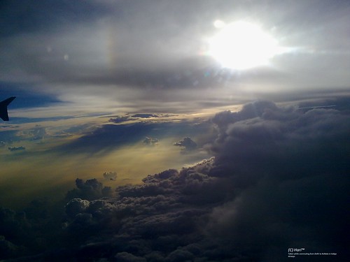 cameraphone door sunset sky sun clouds airplane flying heaven god flight aeroplane holy gateway