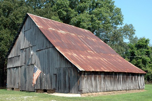 old barn rust flag missouri weathered roadside weatherbeaten mo86