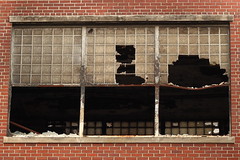 Windows shattered due to fire. Abandoned Barber-Colman factory (later renamed Reed-Chatwood) in Rockford, IL