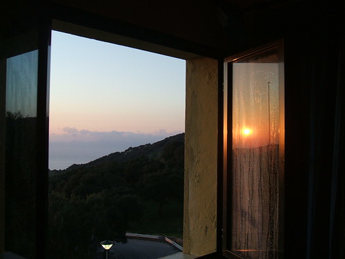 morning light sky orange cloud reflection window yellow sunrise hostel bedroom algeciras genevievelepine