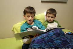 nick reading his little brother a story to cheer him up 