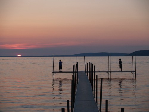 sunset summer vacation lake kids evening pier fishing mood crystal michigan beulah