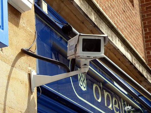 A typical CCTV camera mounted outside a pub
