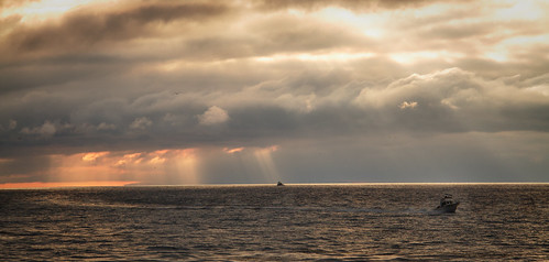 ocean sunrise boat leocarrillo