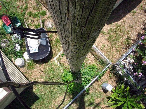 fence cable utilitypole telephonepole wheelbarrow downwardview 00625 reareasement