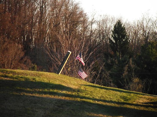 sunset cemetery flag veteransday