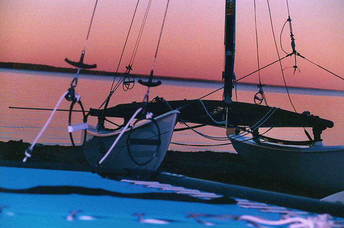 sunset lake boats sail