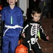 marcus, nick and sequoia leaving a house with their candy in hand
