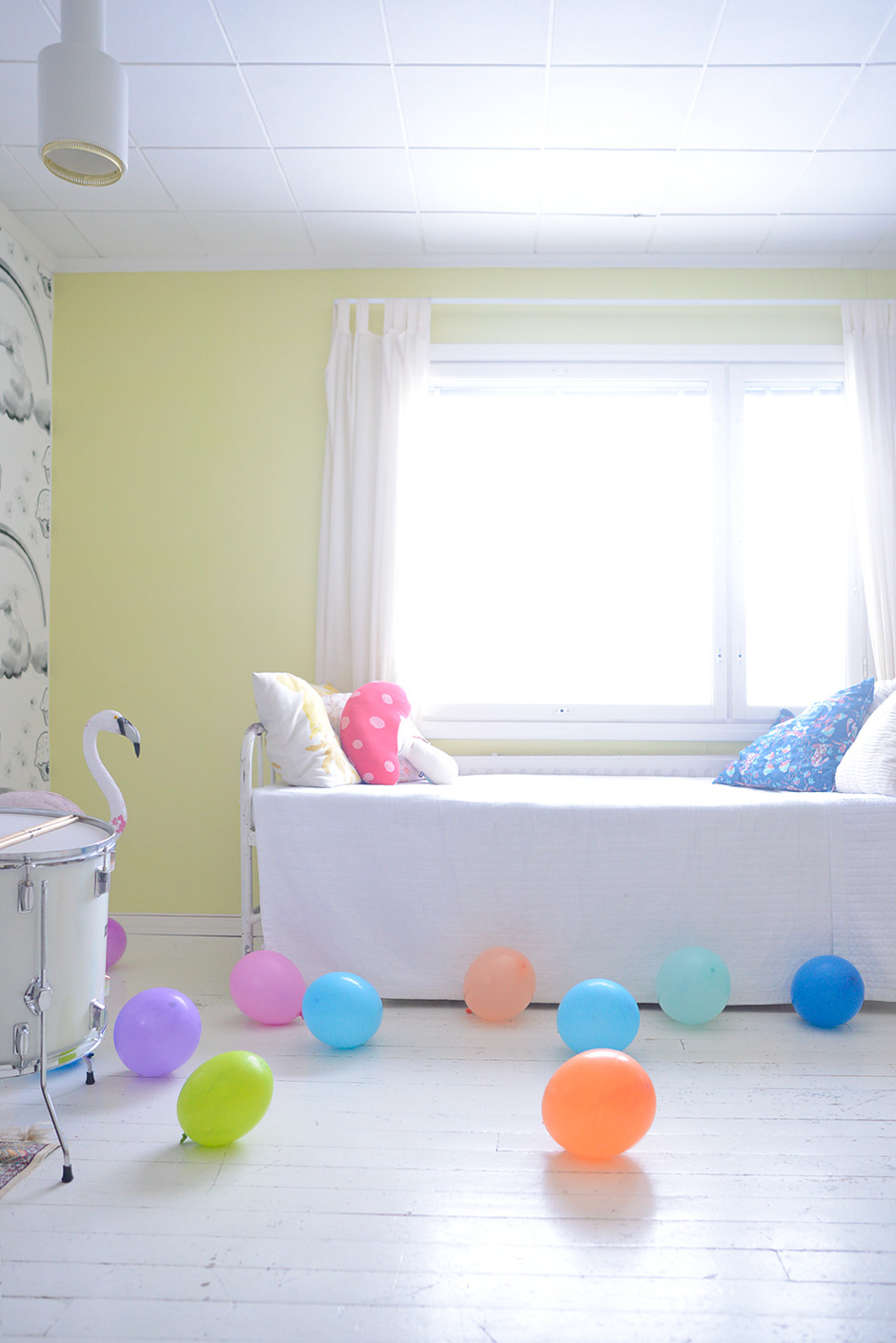 Balloons in a light filled room