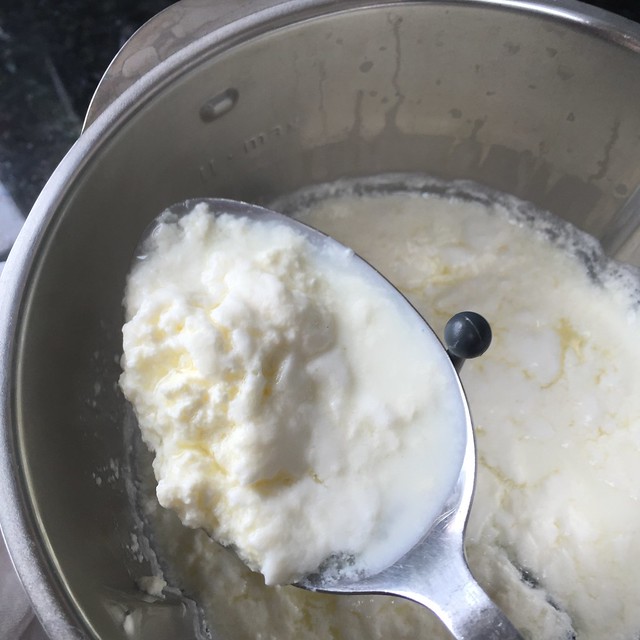 Spooning the ricotta curds