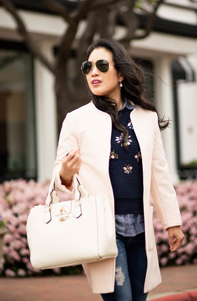 cute & little blog | pink textured coat, jeweled sweater, chambray shirt, distressed petite jeans, white pumps, ray ban aviators | spring outfit
