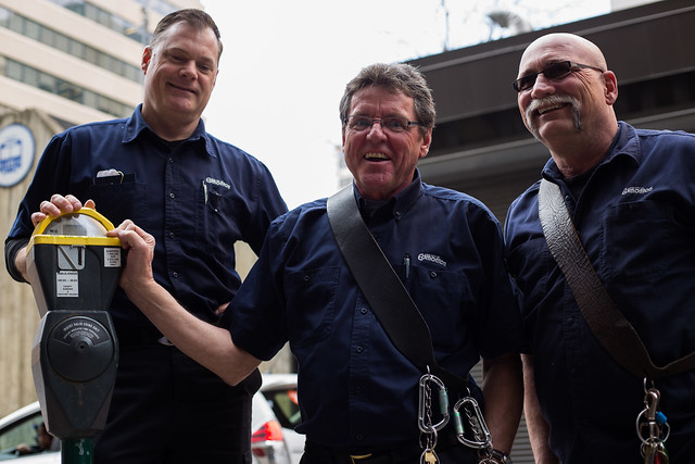 City Staff pose with Edmonton's last parking meter