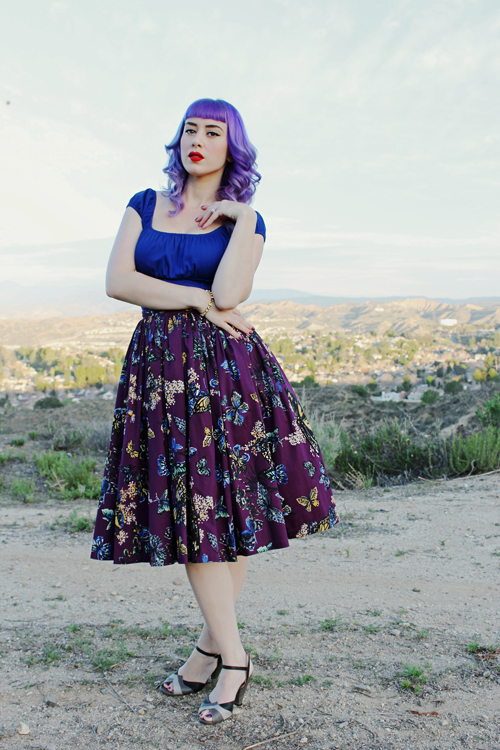 Pinup Girl Clothing Pinup Couture Peasant Top in Royal Blue Jenny Skirt in Moth Print